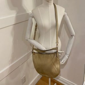 Beautiful gold Michael Kors bag with removable strap.